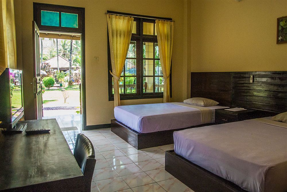 Kuta Indah Hotel Экстерьер фото